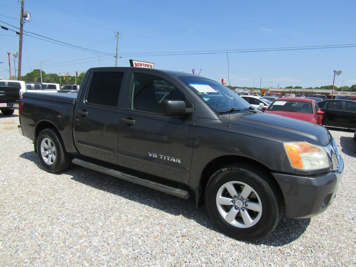 2011 Gray Nissan Titan SV Crew Cab 2WD (1N6BA0ED4BN) with an 5.6L V8 DOHC 32V FFV engine, Automatic transmission, located at 15016 S Hwy 231, Midland City, AL, 36350, (334) 983-3001, 31.306210, -85.495277 - Photo#0